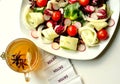 Detoxification concept with vegan salad and herbal