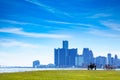 Detroit downtown view and lovely couple on bench