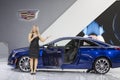 DETROIT - JANUARY 26 :Spokesmodel in front of the new 2015 Cadillac cts at The North American International Auto Show January