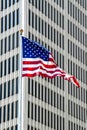 American Flag outside a skyscraper in downtown Detroit Royalty Free Stock Photo