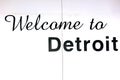 Detroit text on white sheet metal board at downtown Detroit