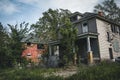 Detroit, Michigan, May 18, 2018: Abandoned and damaged single family home near downtown Detroit.