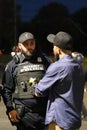 Detroit police officer speaks with resident after protest Royalty Free Stock Photo