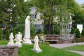 Statues of Mary and children praying in the garden at the Casey Solanus Center