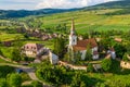 Deutsch Kreuz village Crit aerial view with fortified Church in Transylvania, Romania