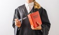 Deutsche Gesetze (German for: German laws ) German Lawyer with civil law code in a court room Royalty Free Stock Photo