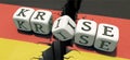 Germany in crisis - White dices with the German word `KRISE` CRISIS Royalty Free Stock Photo