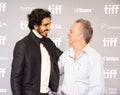 Dev Patel with writer John Collee press conference for Hotel Mumbai Toronto International Film Festival Royalty Free Stock Photo