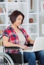 After devastating accident she works from home while recovering Royalty Free Stock Photo
