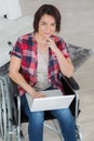 After devastating accident she works from home while recovering Royalty Free Stock Photo