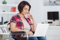 After devastating accident she works from home while recovering Royalty Free Stock Photo