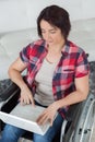 After devastating accident she works from home while recovering Royalty Free Stock Photo