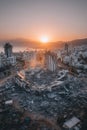 The devastating impact of natural disasters on communities at sunset is exemplified by collapsed buildings Royalty Free Stock Photo