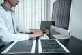 Developer programmer working on coding program software computer in office, Writing website and development database technology Royalty Free Stock Photo
