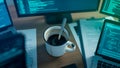 Developer\'s Desk with Coffee and Code Royalty Free Stock Photo