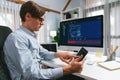 IT developer selecting by point on coding online software. Pecuniary. Royalty Free Stock Photo
