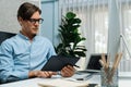 IT developer selecting by point on coding online software. Pecuniary. Royalty Free Stock Photo