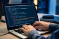 Developer typing complex C# and JavaScript code related to web dev with React/Redux