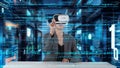 IT developer typing computer code for analyzing intelligent by VR. Contraption.