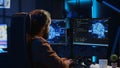 Developer uses computer to update artificial intelligence neural networks