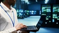 Developer walking through mainframe rows Royalty Free Stock Photo