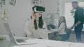 IT developer wearing VR glasses watches virtual videos