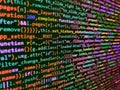 Developer working on program codes. Closeup of Java Script and HTML code. Close up of computer web page code inside of html file. Royalty Free Stock Photo