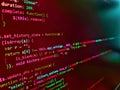 Developer working on program codes in office. WWW software development. Code of javascript language on white background. Coding Royalty Free Stock Photo