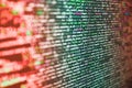 Developer working on software codes in office. Hi-tech modern screen of data, digits and chars on monitor. HTML5 in editor for Royalty Free Stock Photo