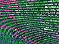 Developer working on software codes in office. Python programming developer code. Javascript functions, variables, objects.
