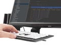 Developer working on source codes on computer at office