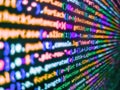 Developer working on websites codes in office. Javascript abstract computer script, random parts of program cod. Cloud information Royalty Free Stock Photo