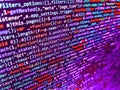 Developer working on websites codes in office. Web abstract programming and created virus on laptop screen. Screen of web Royalty Free Stock Photo