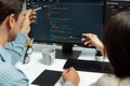 Developers program coding discussing website planning software. Postulate. Royalty Free Stock Photo