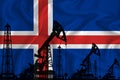 Developing Flag of Iceland. Silhouette of drilling rigs and oil rigs on a flag background. Oil and gas industry. The concept of