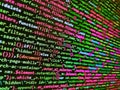 Developing programming binary code. Screen of web developing php code on dark background. Background of software developer script Royalty Free Stock Photo