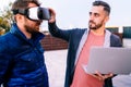 programming and coding technologies with virtual reality goggles. Coders working on new applications Royalty Free Stock Photo