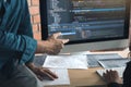 Developing programming and coding technologies working in a software engineers developing applications together in office Royalty Free Stock Photo
