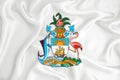 A developing white flag with the coat of arms of Bahamas. Country symbol. Illustration. Original and simple coat of arms in
