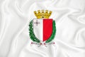 A developing white flag with the coat of arms of Malta. Country symbol. Illustration. Original and simple coat of arms in official