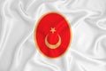 A developing white flag with the coat of arms of Turkey. Country symbol. Illustration. Original and simple coat of arms in