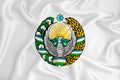 A developing white flag with the coat of arms of Uzbekistan. Country symbol. Illustration. Original and simple coat of arms in