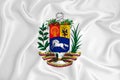 A developing white flag with the coat of arms of Venezuela. Country symbol. Illustration. Original and simple coat of arms in