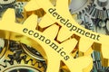 Development Economics concept on the gearwheels, 3D rendering