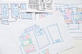 Development and sketches on paper of a custom mobile application on the desktop, graphic design Royalty Free Stock Photo