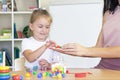 Developmental and speech therapy classes with a child-girl.