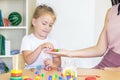 Developmental and speech therapy classes with a child-girl.