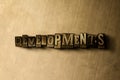 DEVELOPMENTS - close-up of grungy vintage typeset word on metal backdrop