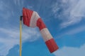 A device for determining the direction of the wind on a metal pole. Royalty Free Stock Photo