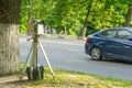 The device for measuring the speed of the car. The police hid behind a tree.